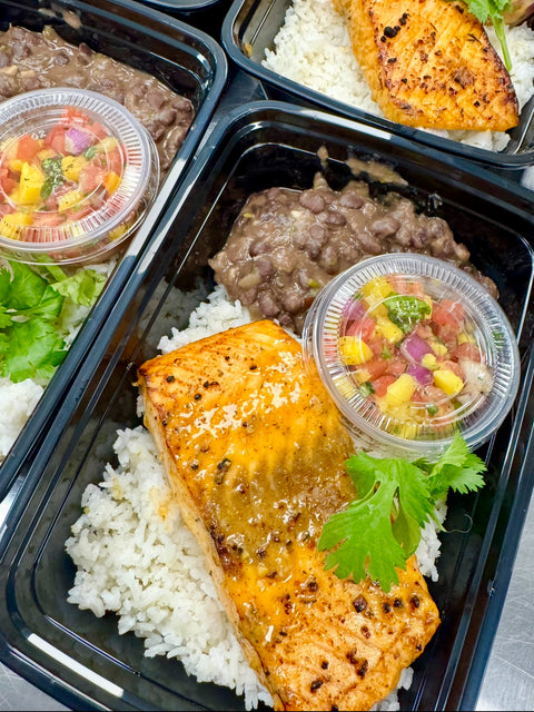 Mojito chicken or salmon, mango & pineapple salsa, black beans & rice (GF)