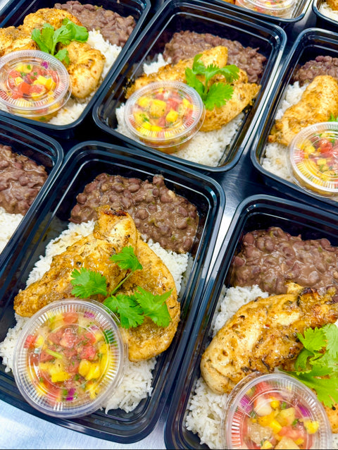 Mojito chicken or salmon, mango & pineapple salsa, black beans & rice (GF)