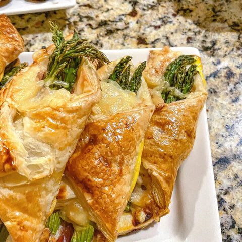 Asparagus with prosciutto & fontina cheese wrapped in puff pastry